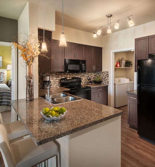 model kitchen at Highland Groves at Morrison Ranch Apartments in Gilbert, Arizona