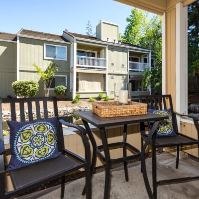 Back patio with tables and chairs at Haven Martinez in Martinez, California