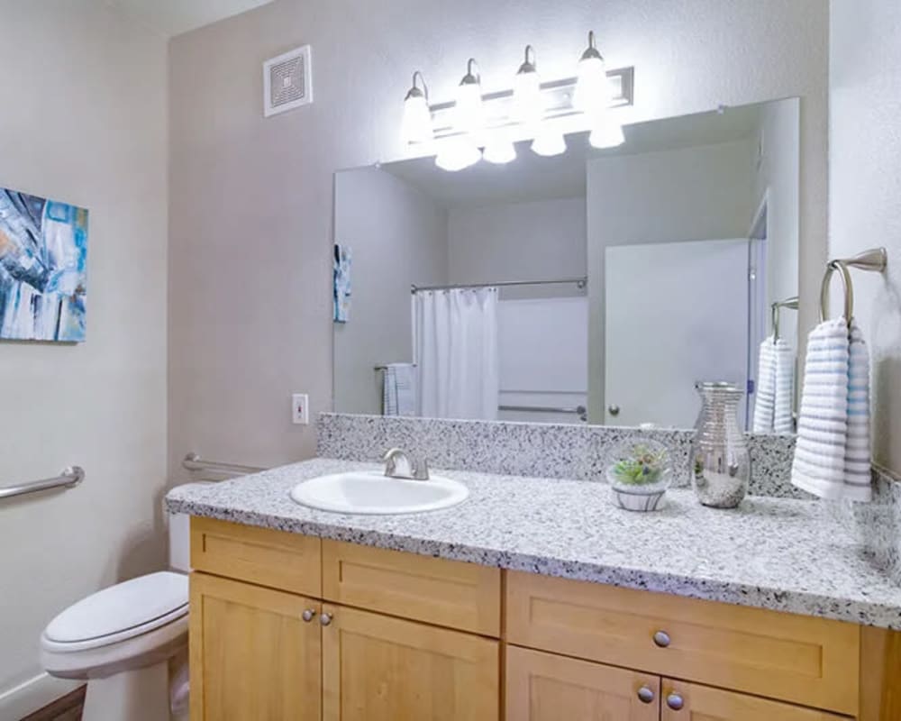 Bathroom with large vanity at Seville at Mace Ranch in Davis, California