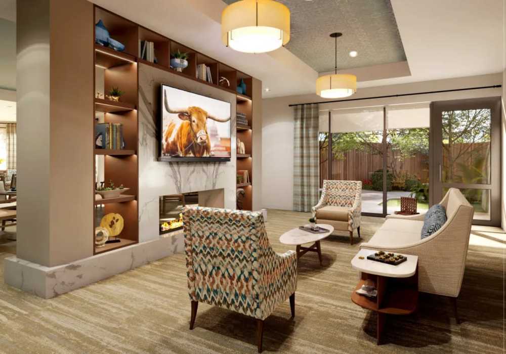 Spacious living room with ambient lighting at Clearwater at The Arboretum in Austin, Texas