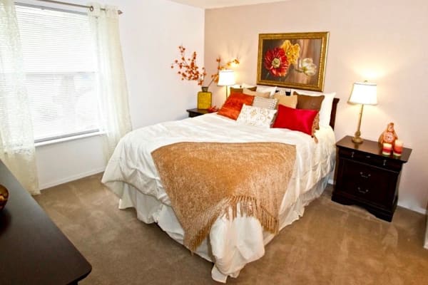 cozy yellow bedroom at Royal Pointe in Virginia Beach, Virginia