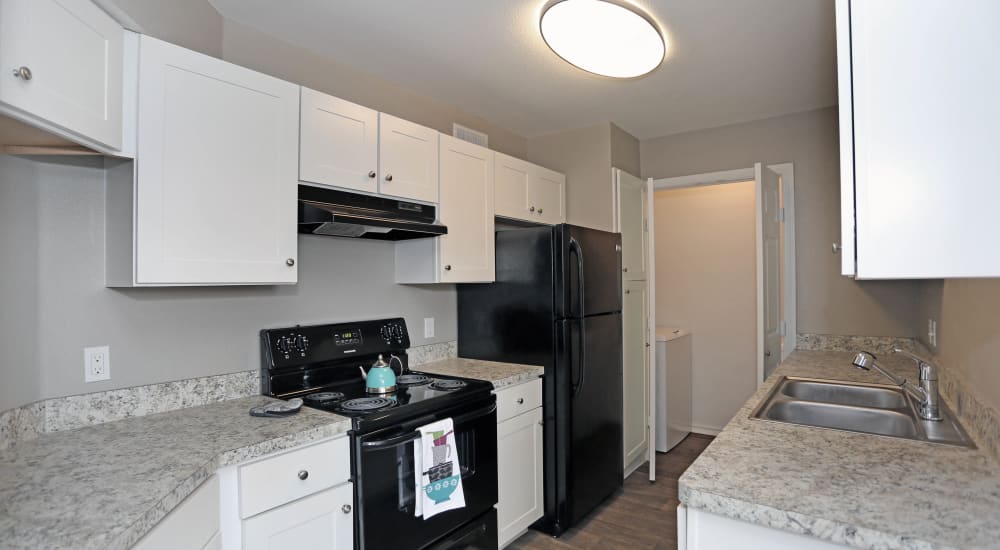 Kitchen with granite counters at 1303 Main in Duncanville, Texas