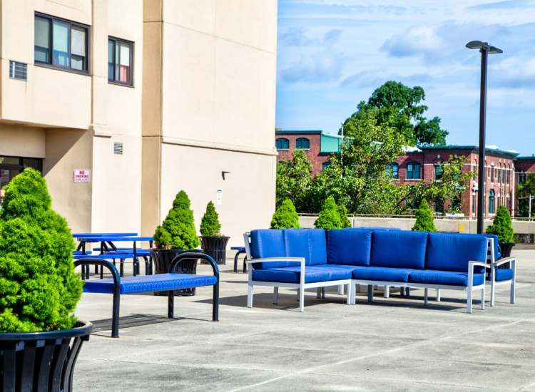 Outdoor seating space at Melville Towers in New Bedford, Massachusetts