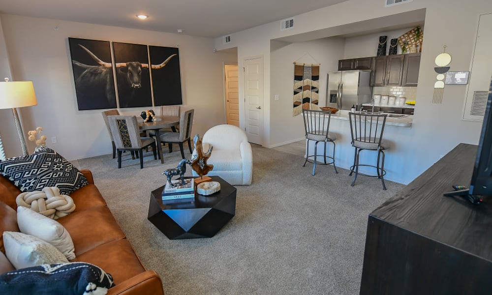 Open and bright model living room at 97@ North Oak in Kansas City, Missouri