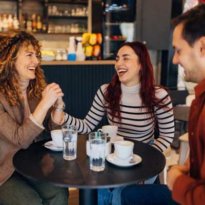 Friends having coffee at Lake Pointe Apartments in Madison, Wisconsin.