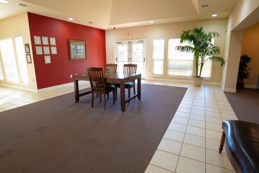 Dining area of clubhouse at Millpoint Townhomes in Henderson, Texas