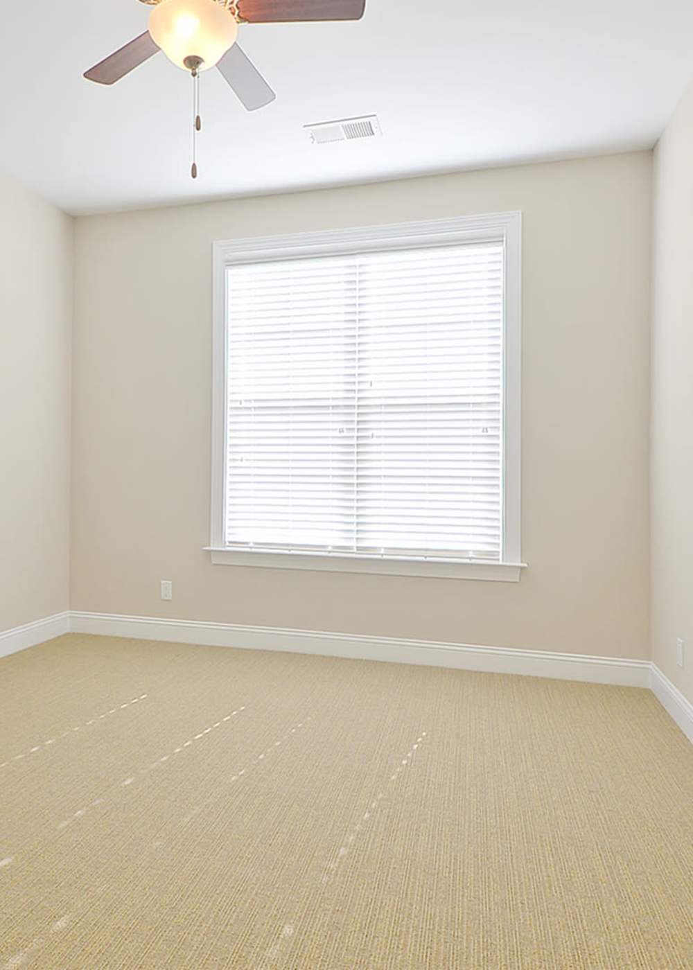 Bedroom with plush carpeting at Marshall Springs at Gayton West in Glen Allen, Virginia