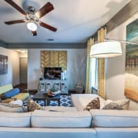 Modern furnishings in a model apartment's living room at Waterstone at Cinco Ranch in Katy, Texas