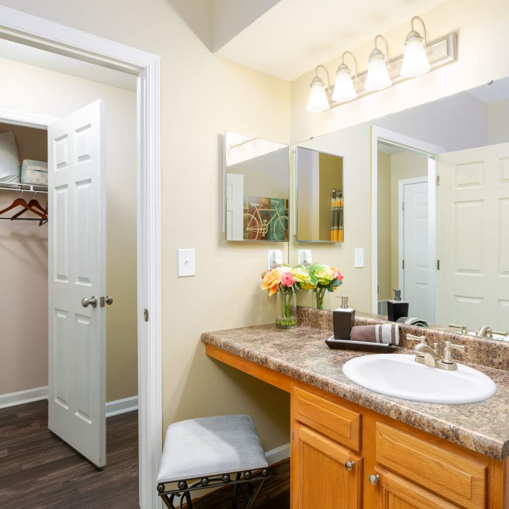 Bathroom with access to closets at Prairie Point Luxury Apartments in O'Fallon. MO