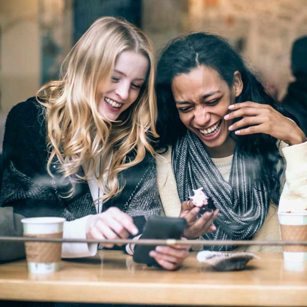 Residents having coffee near Burkart Crossing Apartments in Seymour, Indiana