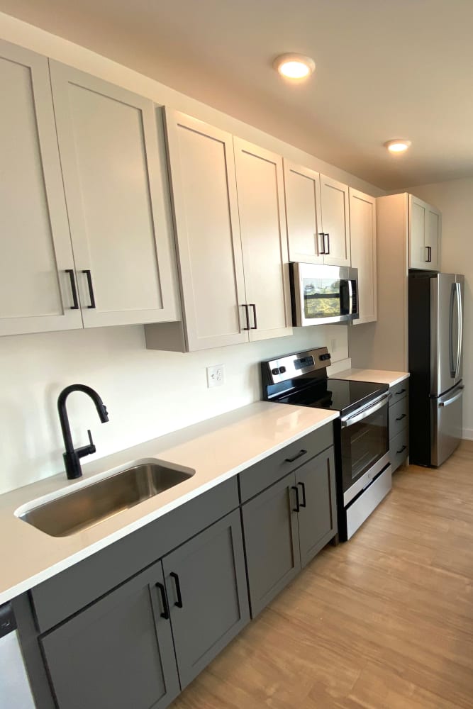 Spacious kitchen with long counters in a model home at Market Flats in Bethlehem, Pennsylvania