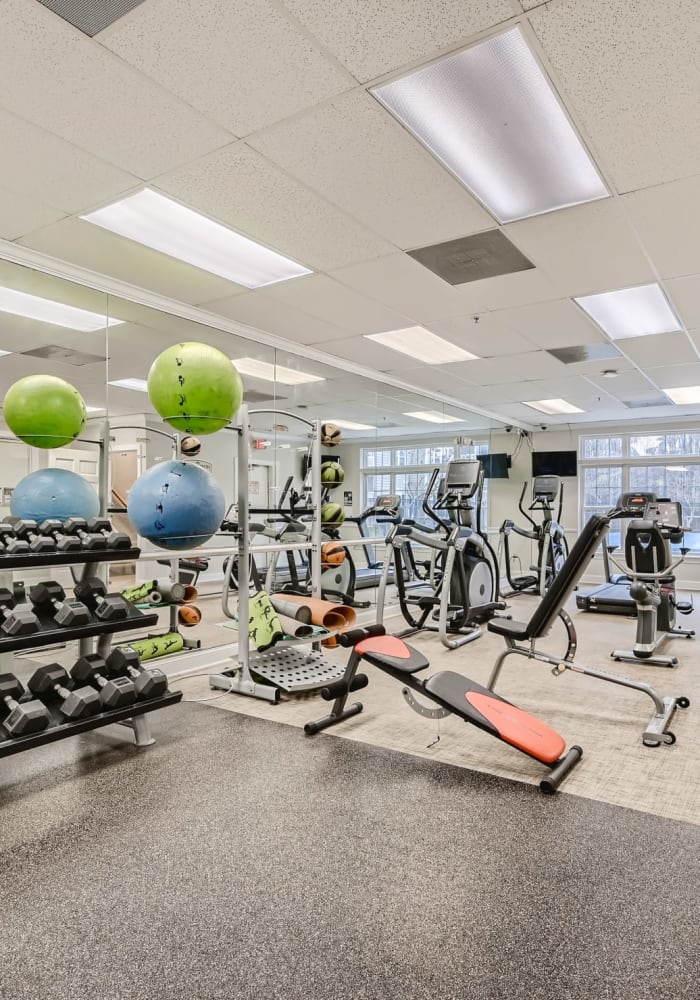 Exercise equipment in the fitness center at Park at Kingsview Village in Germantown, Maryland