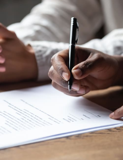 A couple reviews and signs a contract at Storage World in Reading, Pennsylvania