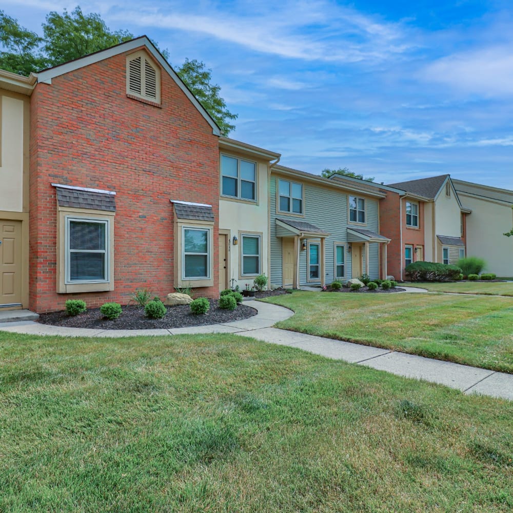 Apartments with lush green lawn at Indian Creek, Reynoldsburg, Ohio