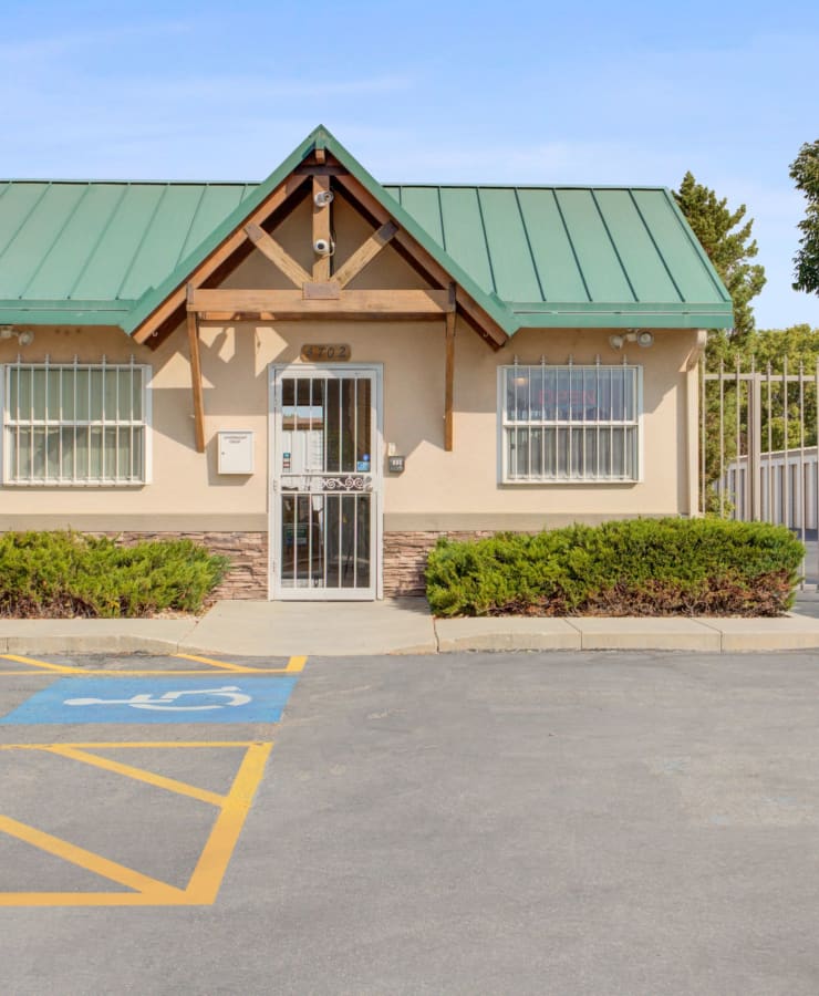 The exterior of the main entrance at StorQuest Economy Self Storage in Kearns, Utah