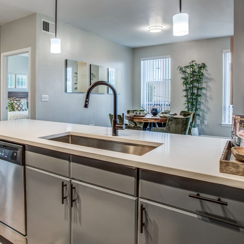 Modern kitchen sink at Cleo Luxury Apartments in Dallas, Texas