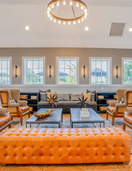 Clubhouse with lots of seating and large windows at Murphy's Farm Apartments in Morganton, North Carolina