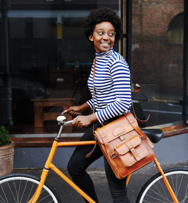 Resident walking her bike near Marquis at Buckhead in Atlanta, Georgia