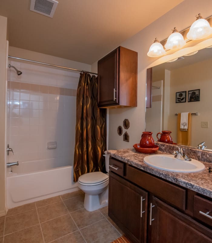 Bathroom with tile flooring at Park at Tuscany in Oklahoma City, Oklahoma