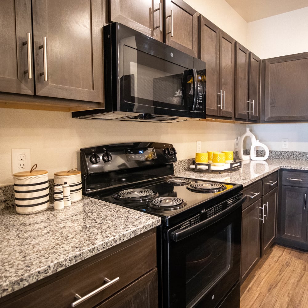 Granite counters in a home's kitchen at Esperanza in San Antonio, Texas