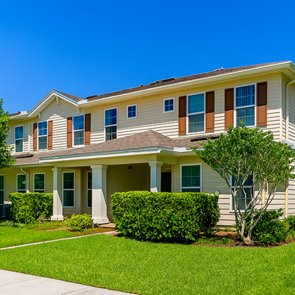 Charming exterior view of the apartment building at The Reserve at Brookhaven in Palm Coast, Florida