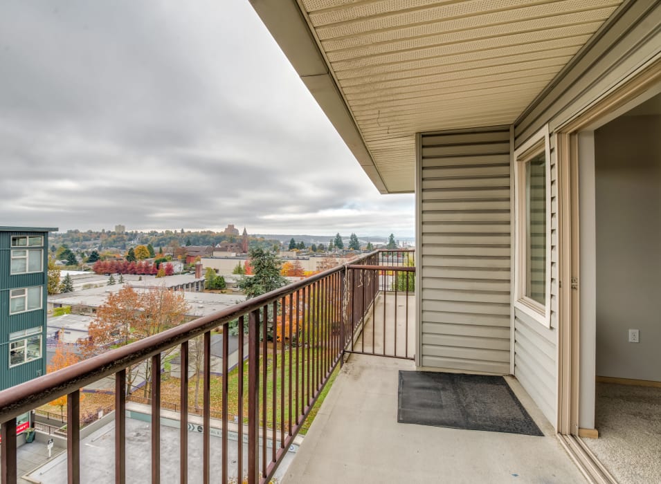 Private balcony with a terrific view of the neighborhood outside a model home at Verse Seattle in Seattle, Washington