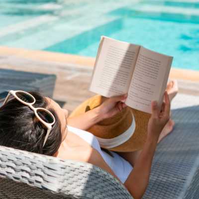 A resident relaxes poolside at Vintage at the Avenue, Murfreesboro, Tennessee