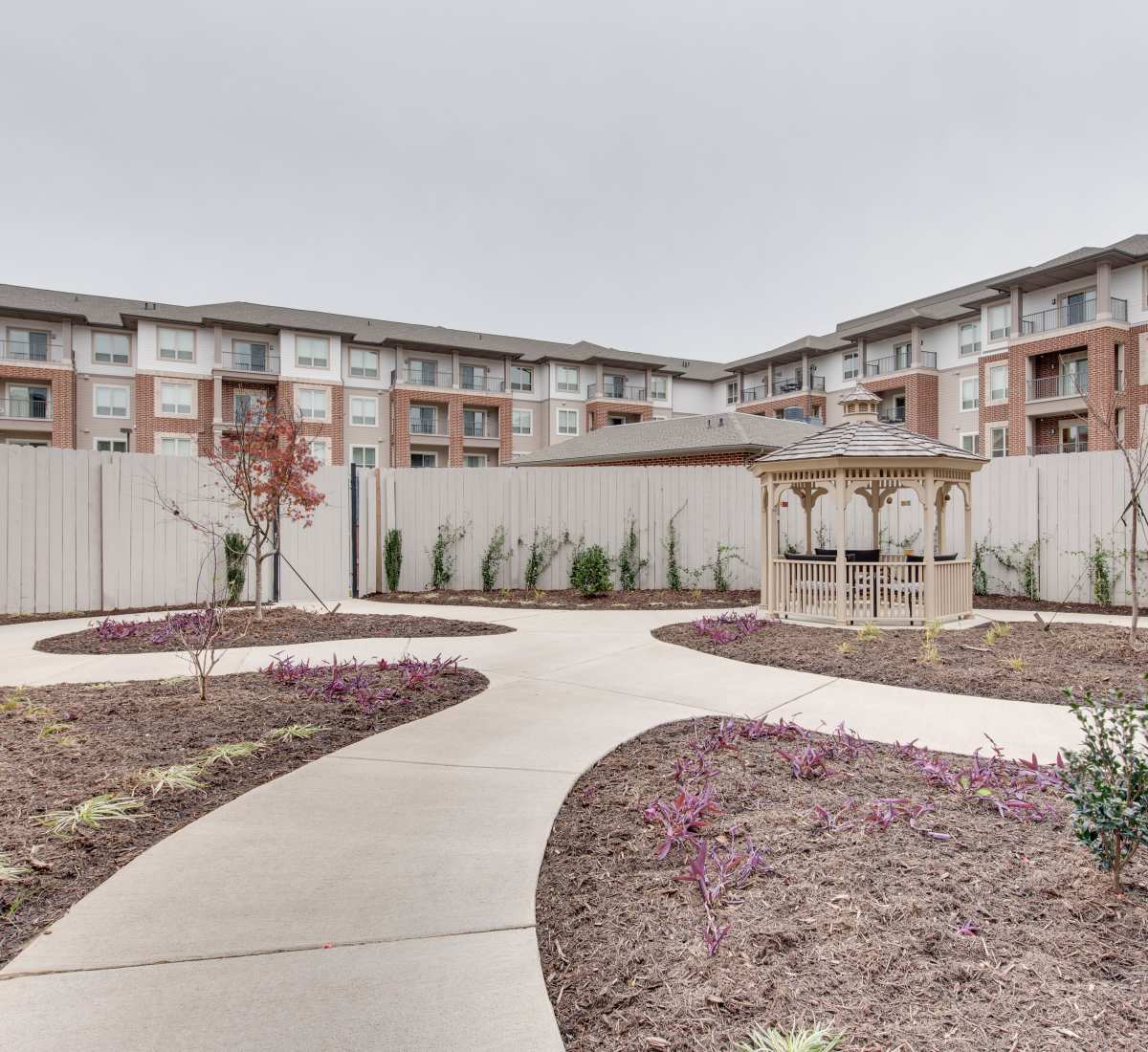 Beautiful exterior space with walkways at Harmony at Oakbrooke in Chesapeake, Virginia
