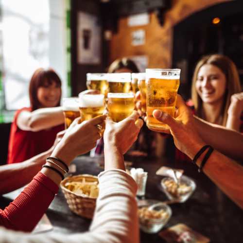 A group of friends enjoying their drinks in a nearby restaurant at Copper Creek in Colorado Springs, Colorado
