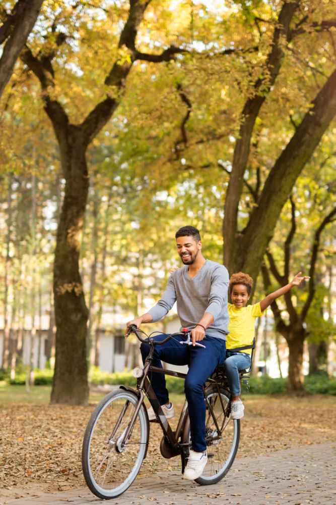 Father and son cycling near Filbin Creek in North Charleston, South Carolina