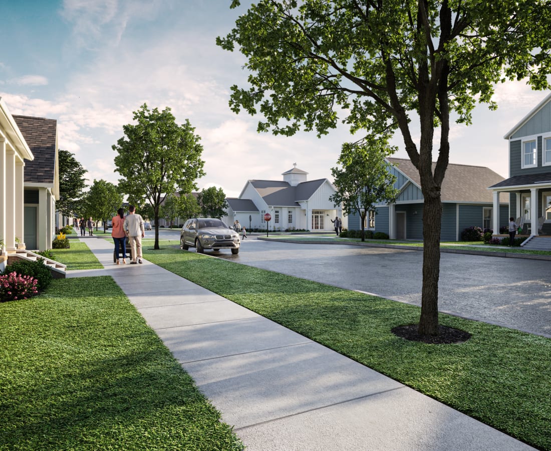 Parking and landscaping outside a home at Hamlet at Wildlight in Yulee, Florida