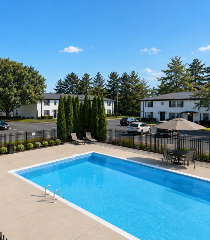 Resident family in swimming pool at Fox Pointe Apartments in Columbus, Indiana