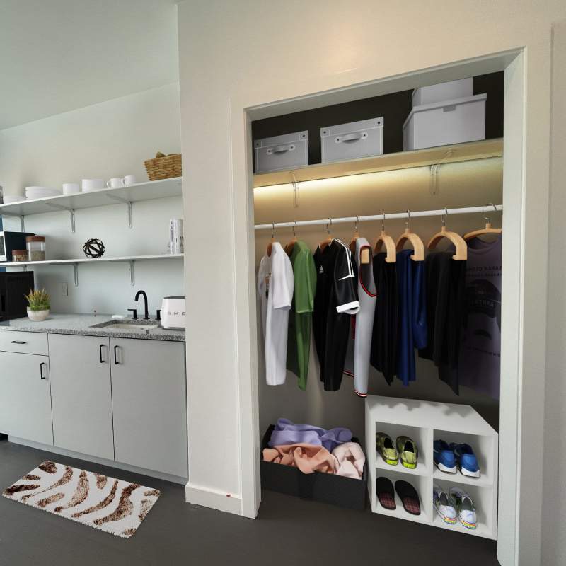 Walk-in closet of a micro-suite apartment at Martin Flats in Nashville, Tennessee