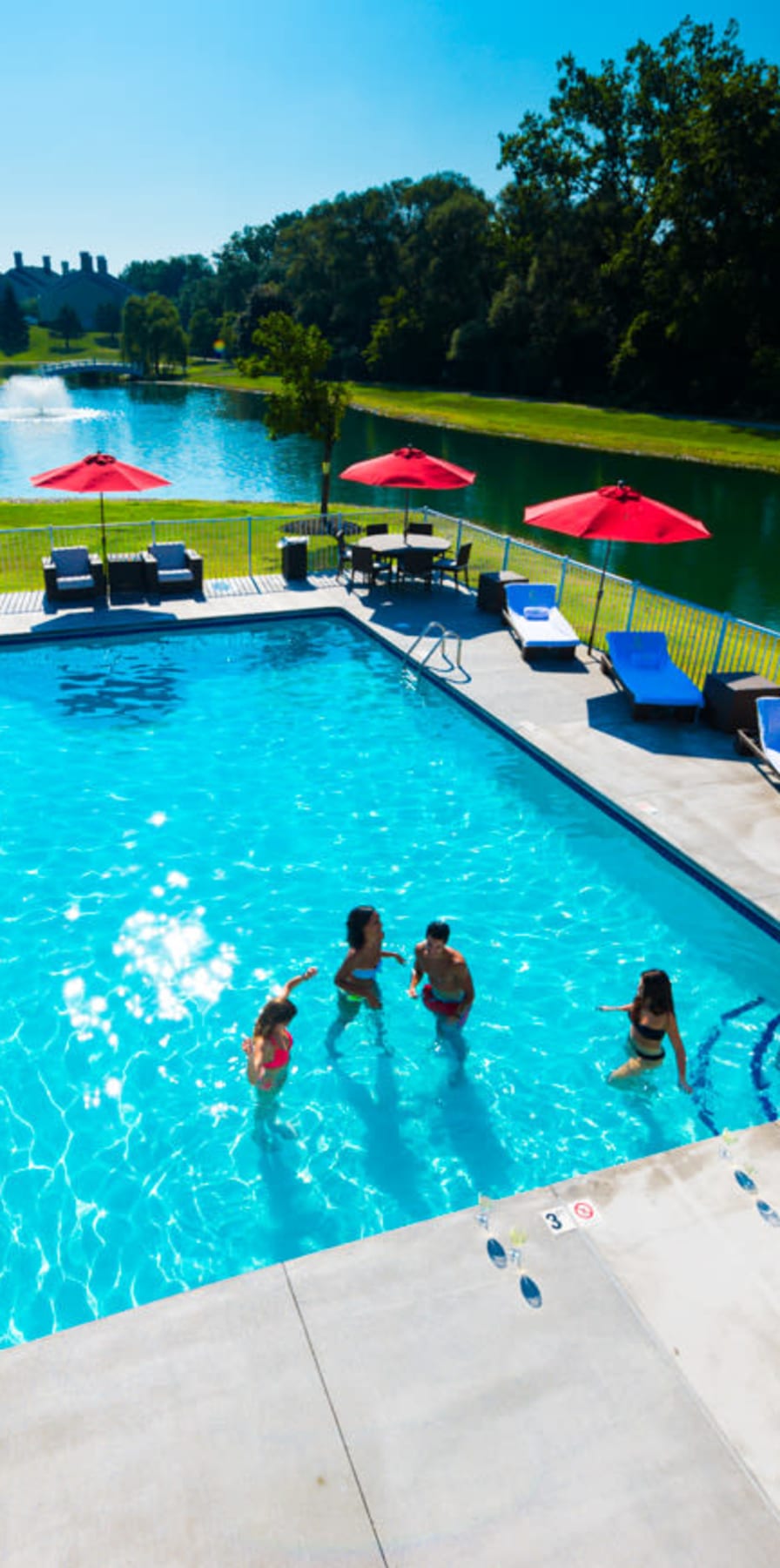 Aerial view of the swimming pool at Woodland Mews in Ann Arbor, Michigan