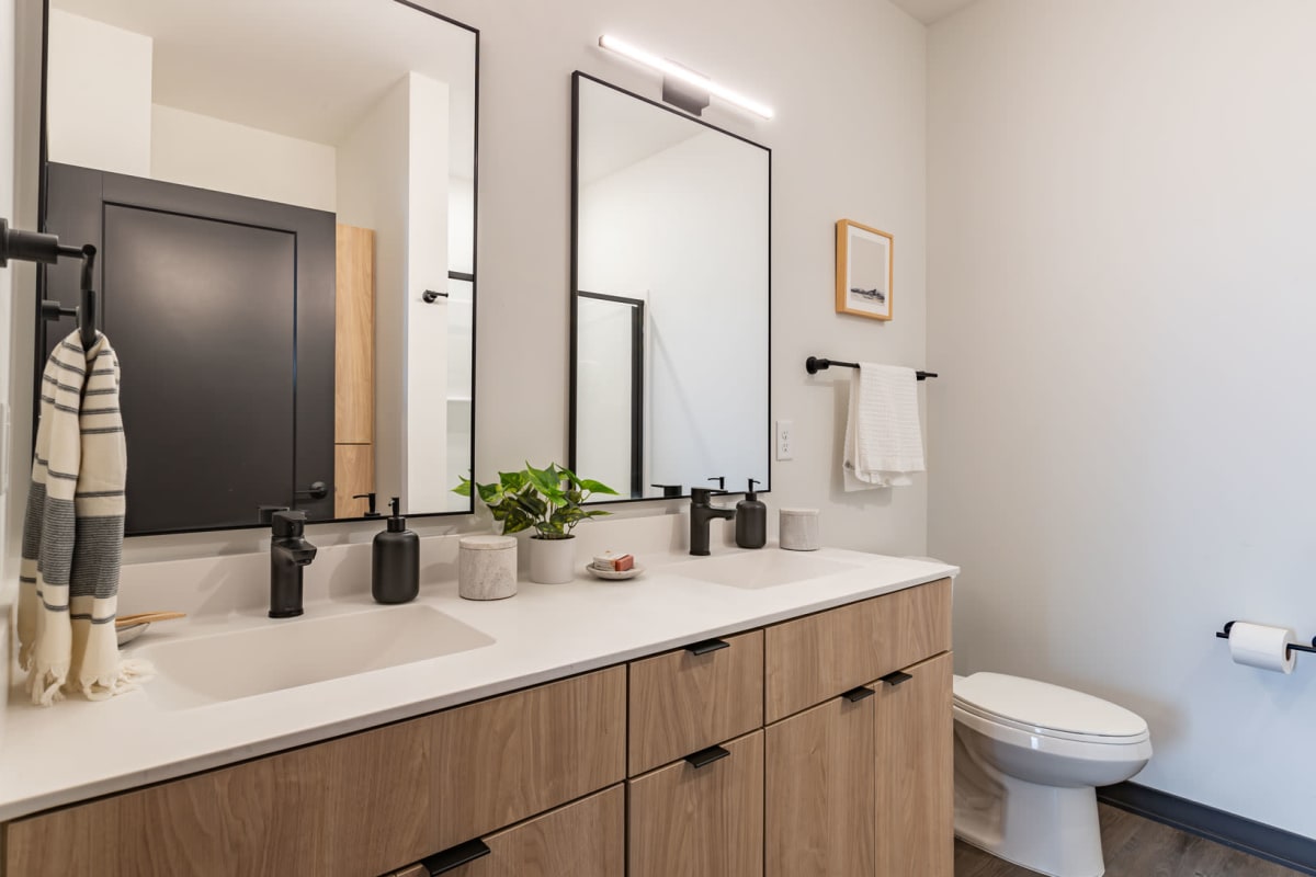 Modern finishes in an apartment bathroom at Carbon31 in Bloomington, Minnesota