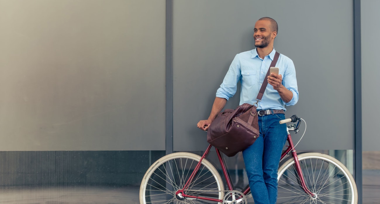 Resident stopping for a break on a bike ride near The Townhouse in South Orange, New Jersey