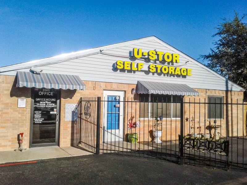 A front view of the office with wrought iron fencing at U-Stor Abilene in Abilene, Texas