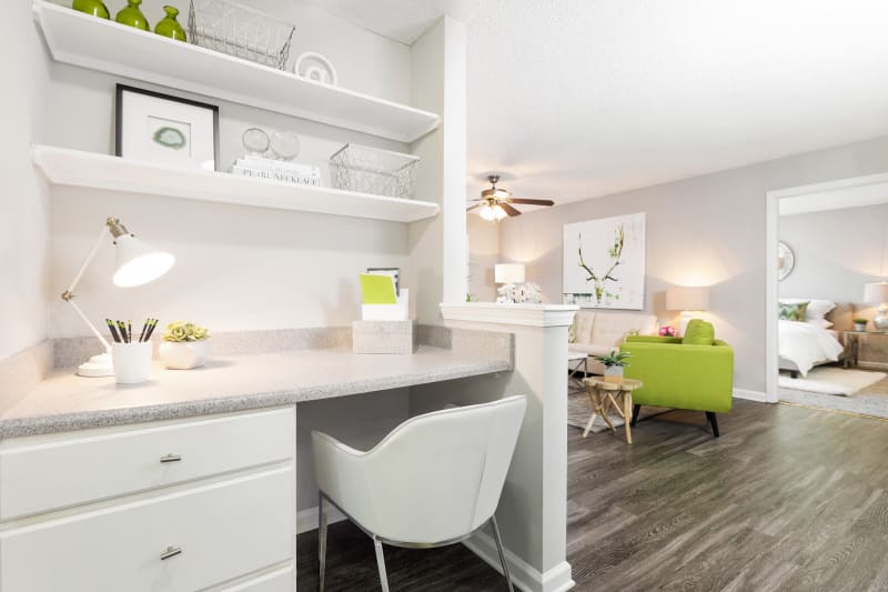 Office nook next to the living area in modern home at Belle Vista Apartment Homes in Lithonia, Georgia