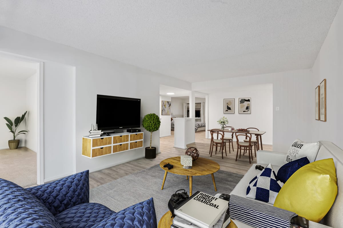 Large living room with hardwood floors at Vistas of Annandale in Annandale, Virginia