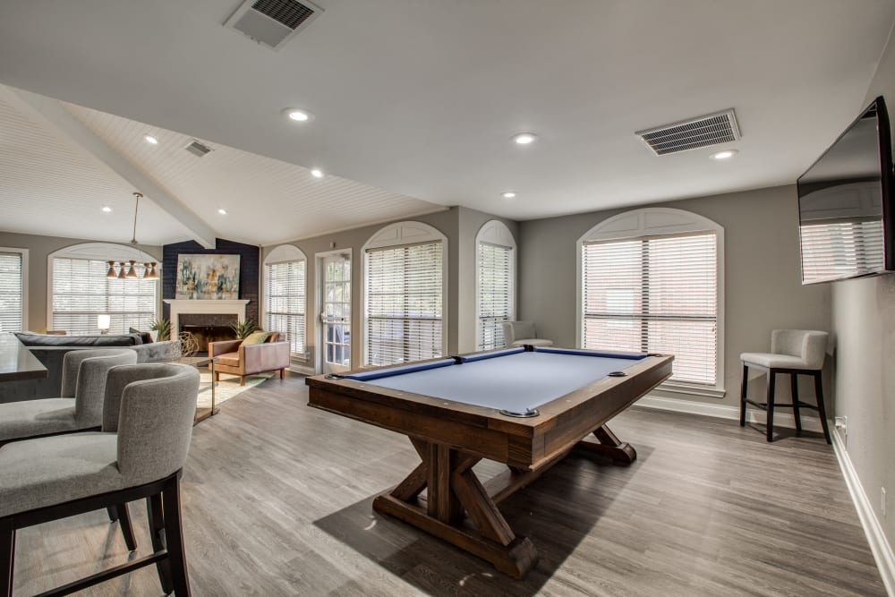 A billiards table in the community clubhouse at Verandahs at Cliffside Apartments in Arlington, Texas