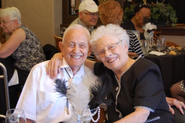 Resident couple hugging at Merrill Gardens at Green Valley Ranch in Henderson, Nevada. 