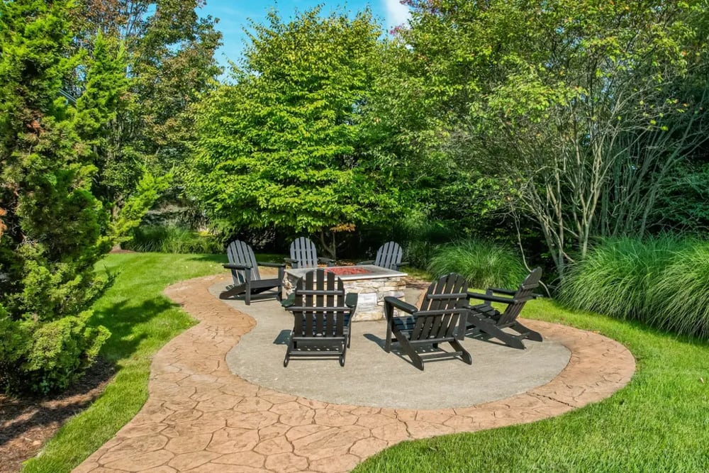 Seating area with firepit in the park at Berkley Manor in Cranberry Twp, Pennsylvania
