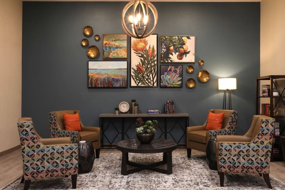 Sitting area with modern furniture at Sunny Garden Apartments in La Puente, California