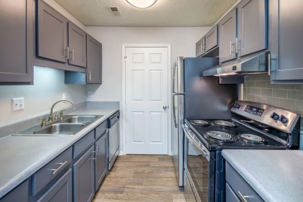 A kitchen with plenty of countertop space at The Harlowe in Charlotte, North Carolina