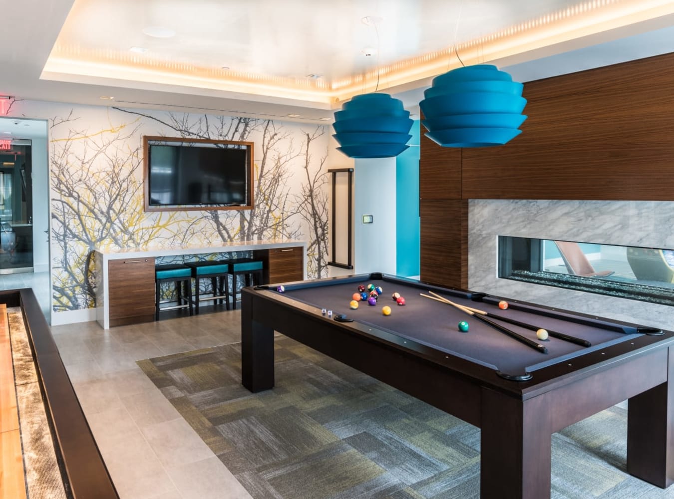 Game room with pool table at Solaire 7077 Woodmont in Bethesda, Maryland