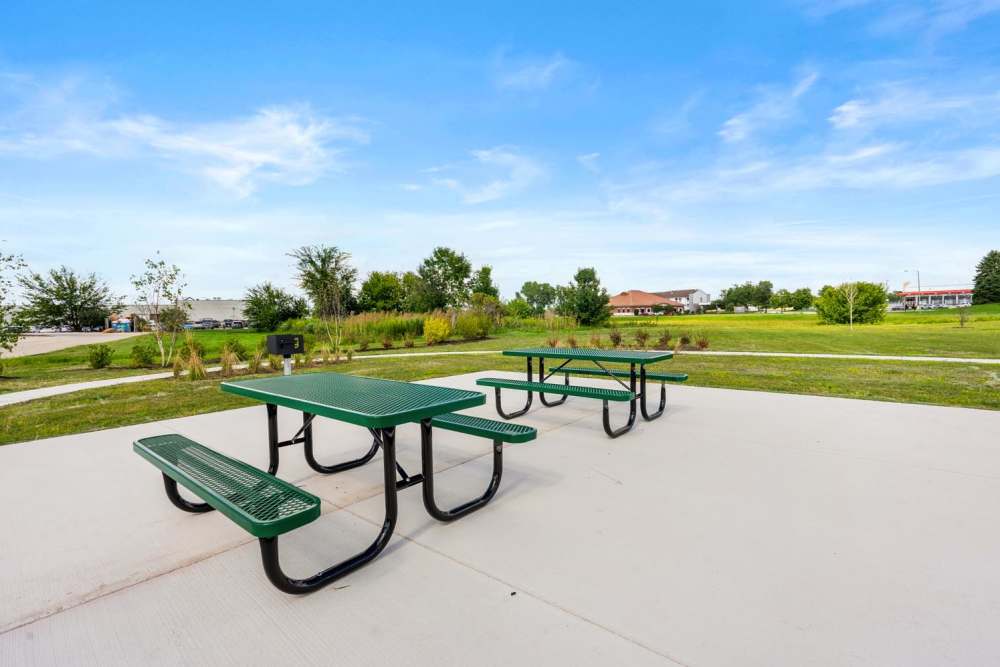 Outdoor seating space of community at Deville Manor in Oswego, Illinois