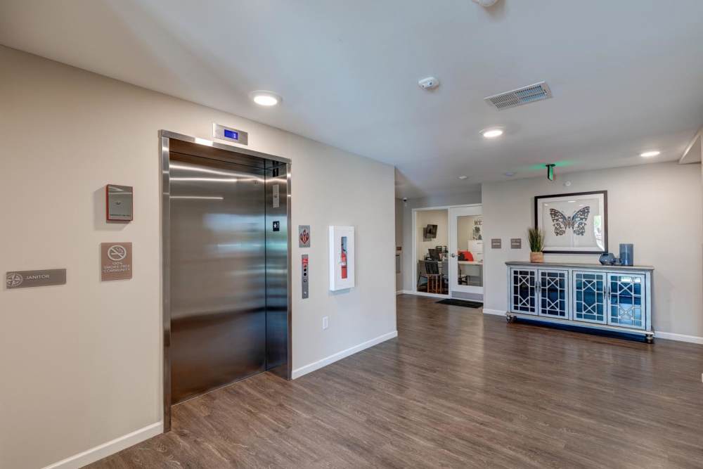 Community elevator with wood flooring at Harpers Crossing in Plainfield. IN