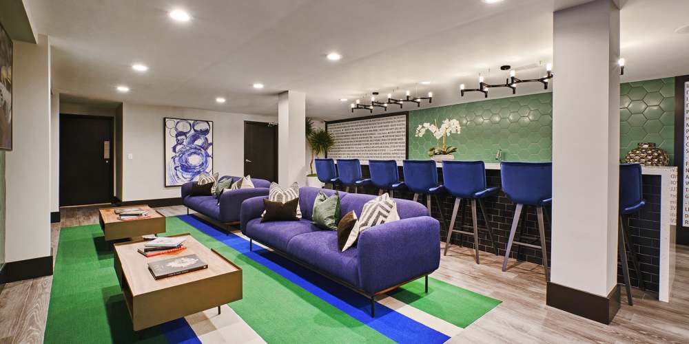 Clinking wine glasses at The Green at 9&90 in Framingham, Massachusetts