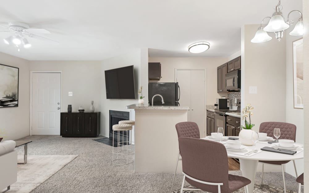 Dining room with kitchen and living room at The Greens at Westgate Apartment Homes in York, Pennsylvania