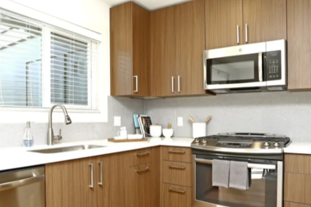 Spacious living area with a nice dining spot next to the kitchen at Parc Marin in Corte Madera, California